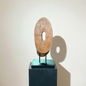 Oval Realistic Carved Tree Trunk Sculpture on a Black Base 8" x 3/5"